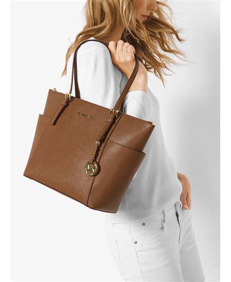 michael kors jet set east west top zip leather tote